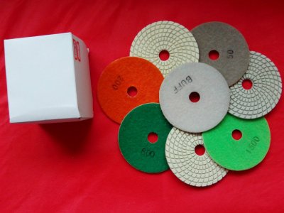 Wet diamond polishing pad