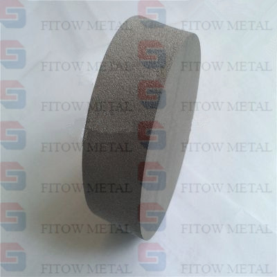 Sintered porous metal filter