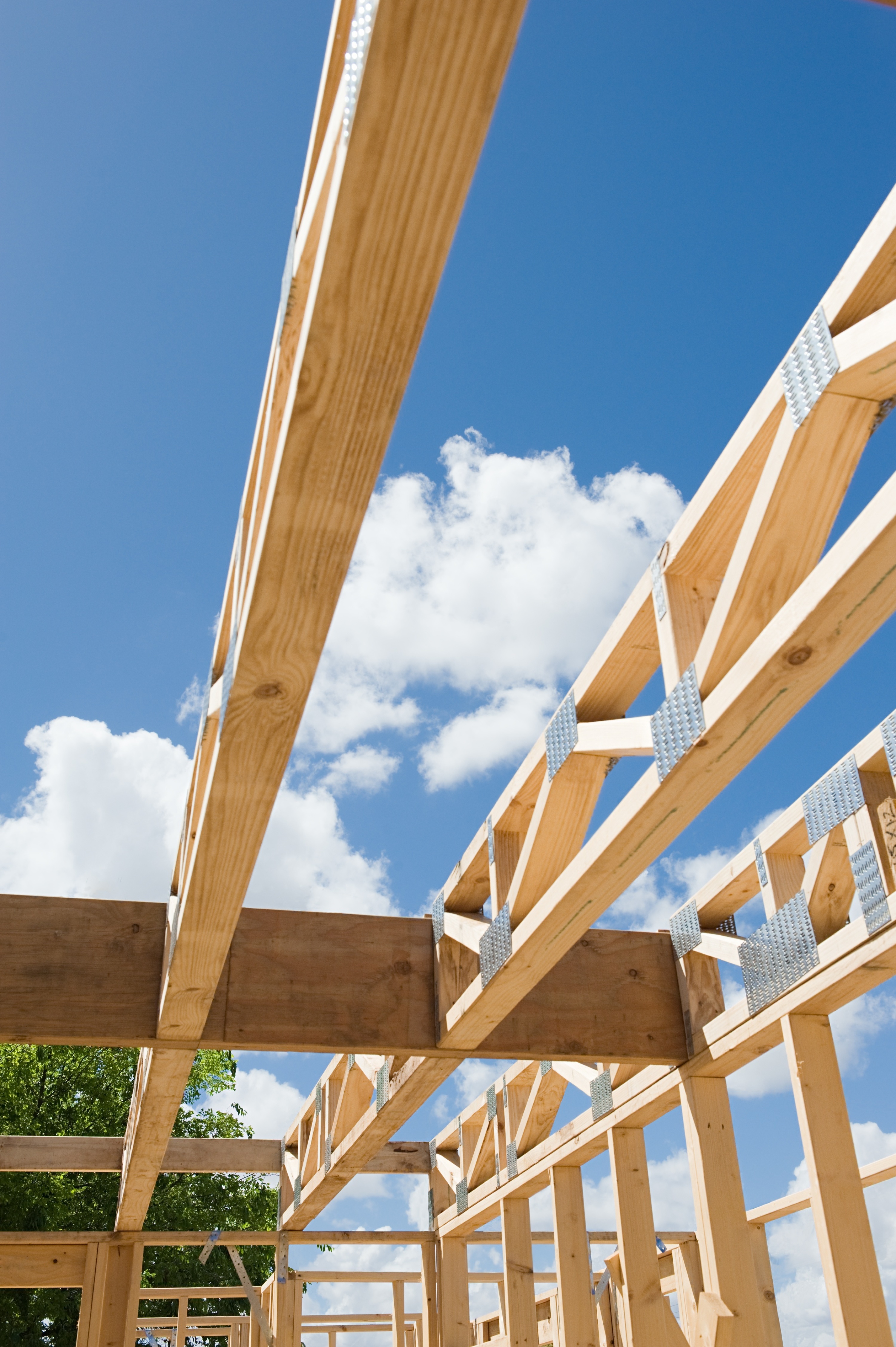 Production of wooden trusses and roof structure.