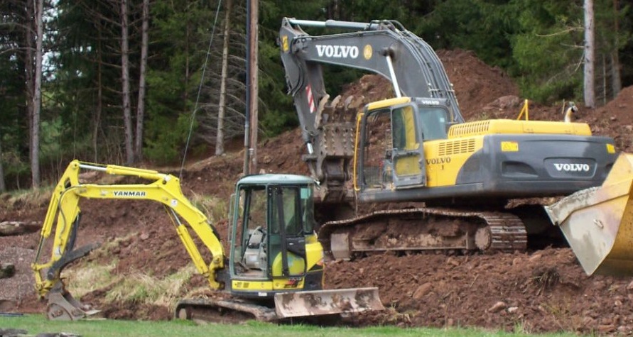 Excavating earthmoving at work