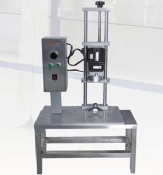 The electric screw cap machine